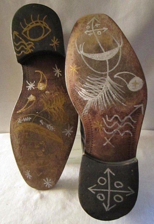 Shoes inscribed with sacred symbols